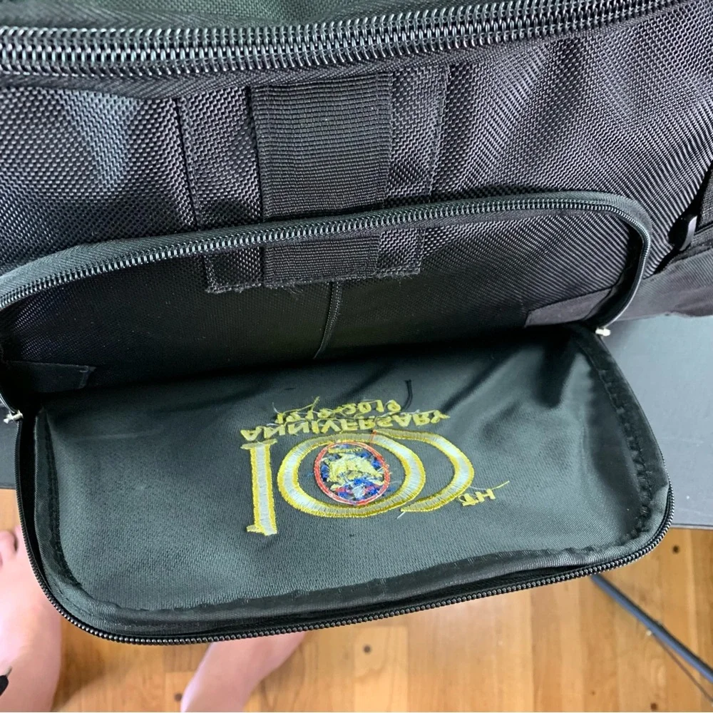 A Black 100th Anniversary Duffel Bag (Masonic?).